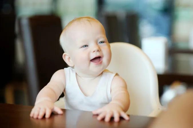 6 month old baby girl gets ready for some organic yummies. 