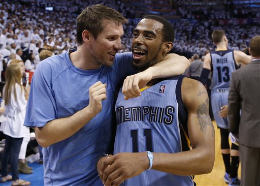 Memphis Grizzlies guard Beno Udrih, left, and guard Mike Conley (11) walk off the court after Game 5 of an opening-round NBA basketball playoff series against the Oklahoma City Thunder in Oklahoma City, Tuesday, April 29, 2014. Memphis won 100-99 in overtime, and lead the series 3-2. (AP Photo)