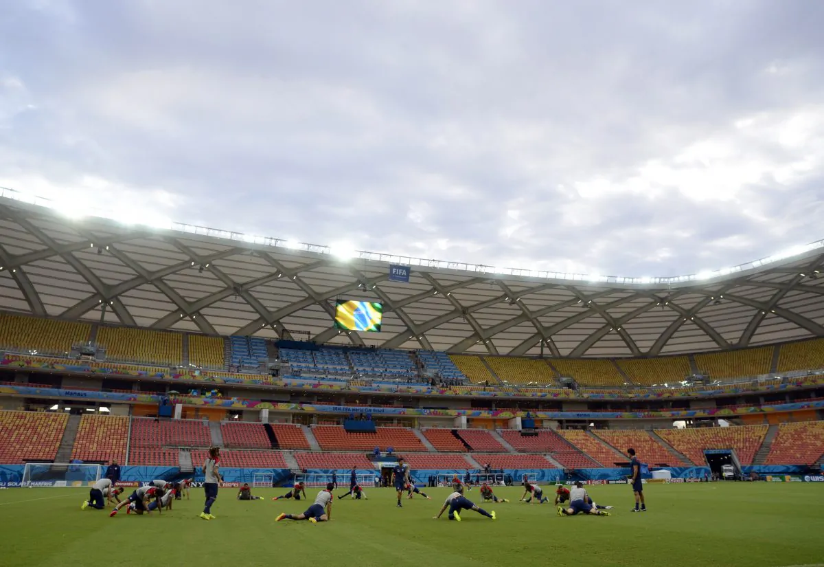 United States' players stretch during a training session at the Arena da Amazonia in Manaus, Brazil, Sunday, June 22, 2014. The U.S. will play Portugal in group G of the 2014 soccer World Cup on June 22. (AP Photo/Paulo Duarte)