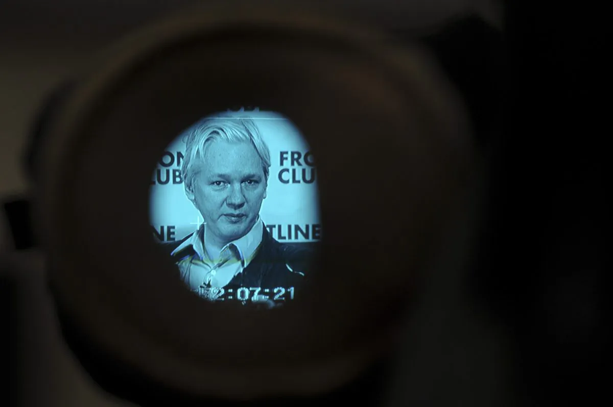 WikiLeaks founder Julian Assange is picture through a camera viewfinder as he speaks at a press conference in central London on Feb. 27, 2012. (Carl Court/AFP/Getty Images)