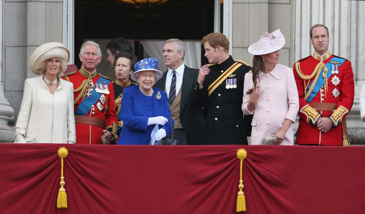 Camilla, Duchess of Cornwall, Prince Charles, Prince of Wales, Sir Timothy Laurence, Princess Anne, Princess Royal, Queen Elizabeth II, Prince Andrew, Duke of York, Prince Harry, Catherine, Duchess of Cambridge and Prince William, Duke of Cambridge stand on the balcony at Buckingham Palace during the annual Trooping the Colour Ceremony on June 15, 2013 in London, England. (Chris Jackson/Getty Images)