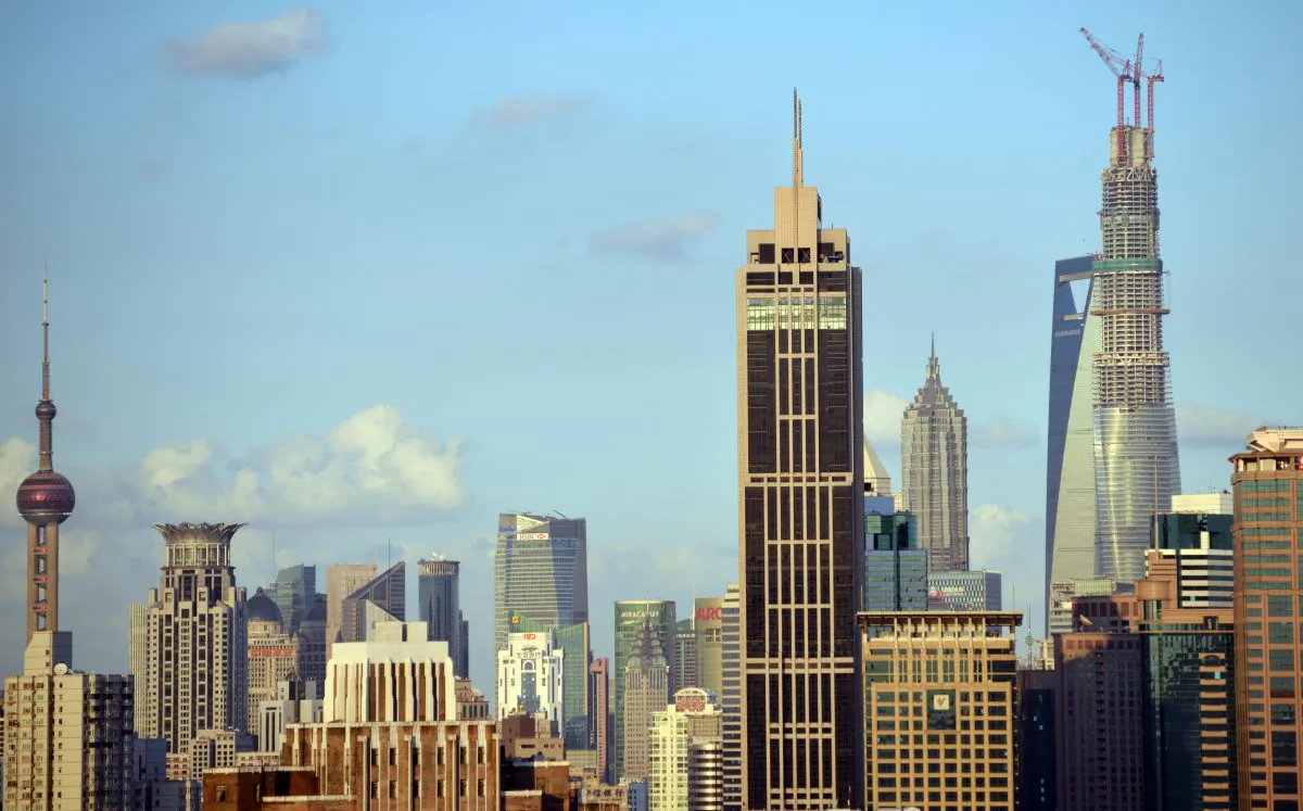 Commercial and residential property in Shanghai on Sept. 30, 2013. Chinese officials are attempting to bolster demand in the real estate sector as the market seems to face an inevitable decline. (Peter Parks/AFP/Getty Images)