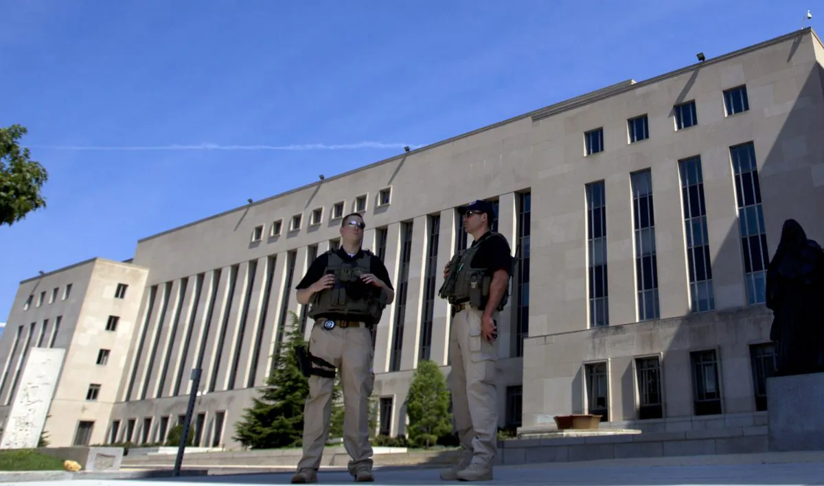 U.S. Marshalls guard the area outside of the federal U.S. District Court in Washington on June 28, 2014. (Jose Luis Magana/AP Photo)