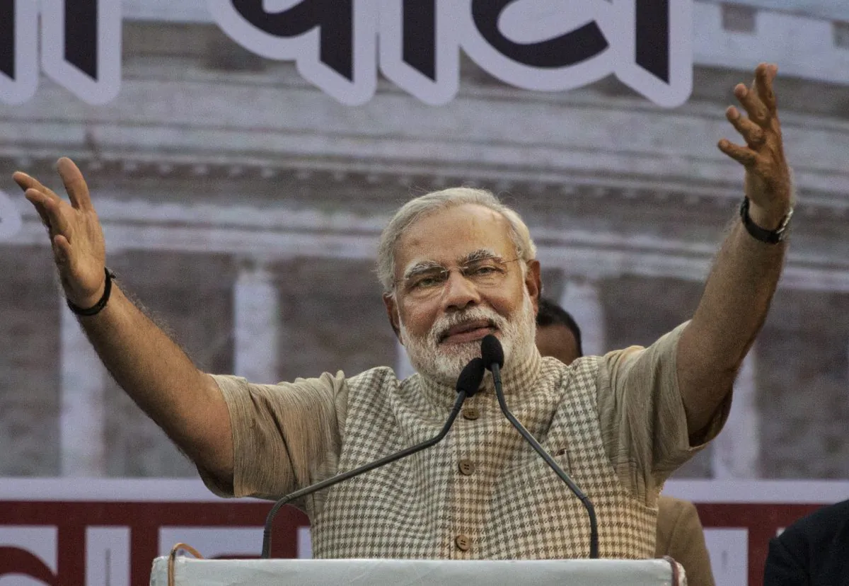 Narendra Modi, India's Prime Minister, gestures while speaking to supporters after his landslide victory in elections on May 16, 2014 in Vadodara, India. Modi's government could change the power dynamics in Asia if it fulfills its promises to make India internally strong. (Kevin Frayer/Getty Images)