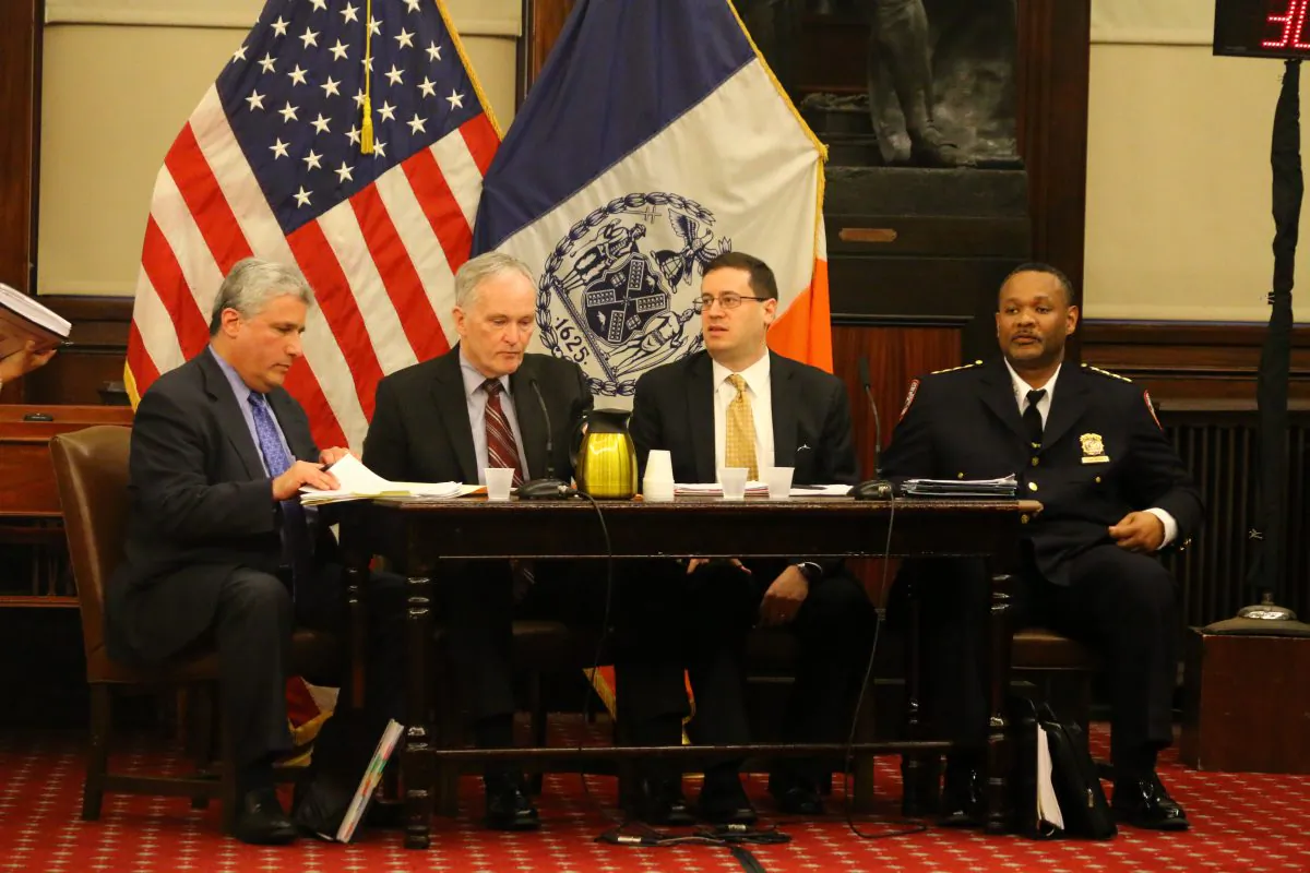 New York City Department of Correction executives testify at New York City Council hearing on Monday. (L-R) Senior Deputy Commissioner Ari Wax, Commissioner Joseph Ponte, Deputy Commissioner for Strategic Planning and Programs Erik Berliner, Chief of Department William Clemons. (Brendon Fallon/Epoch Times)