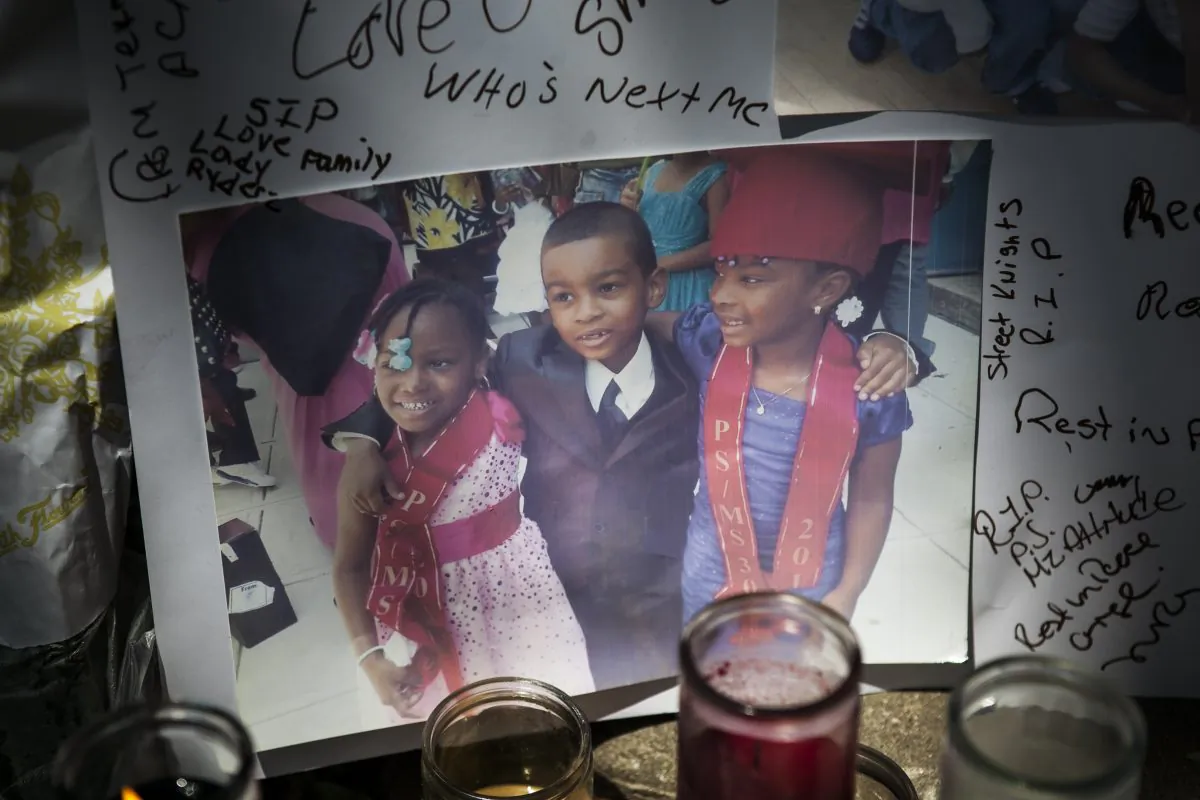 The vigil for Prince Joshua Avitto (C), 6, who was stabbed to death on June 1, at the Boulevard Housing project in East New York City on June 3, 2014. (Samira Bouaou/Epoch Times) 