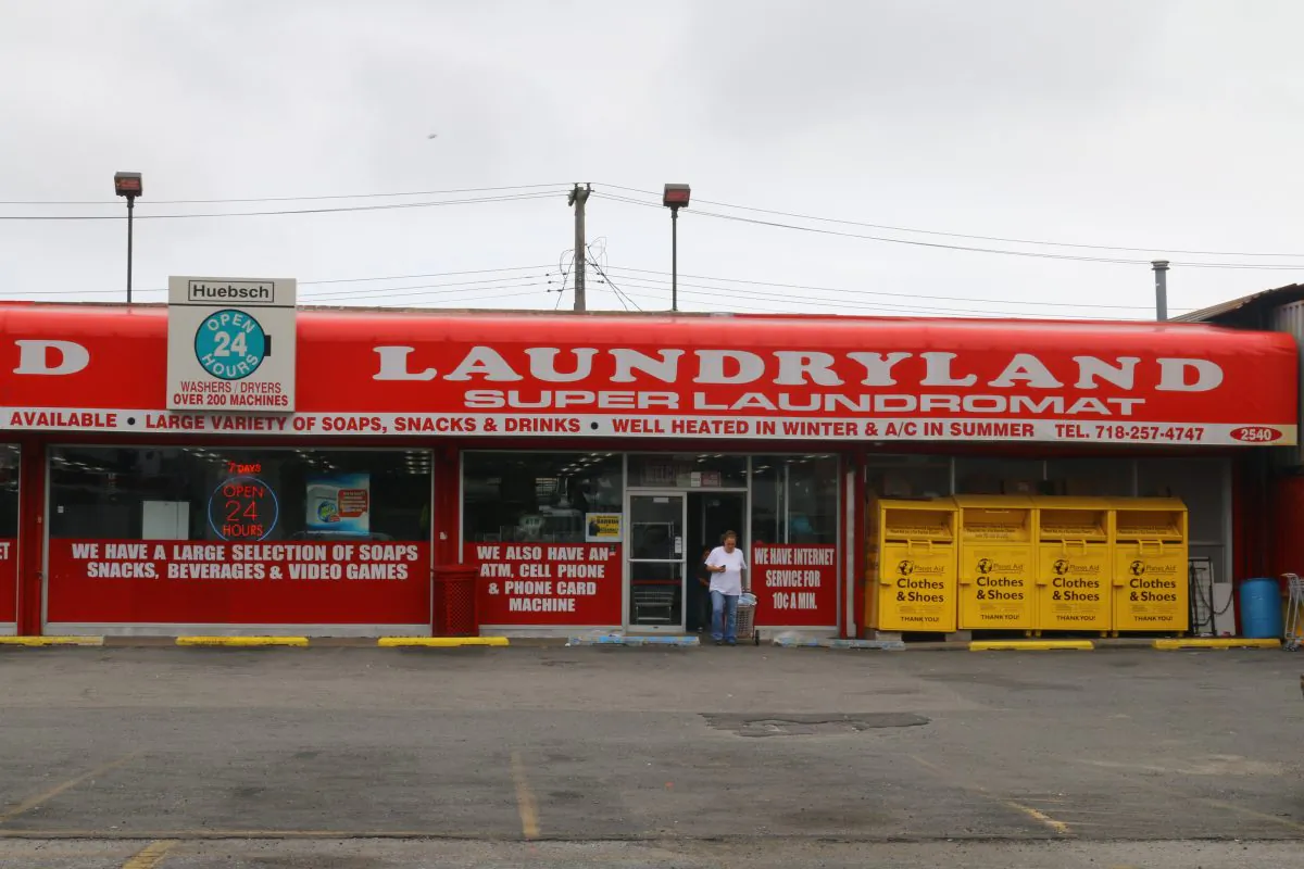 Street view of Laundry Land, target of armed robbery on March 18. (Brendon Fallon/Epoch Times)