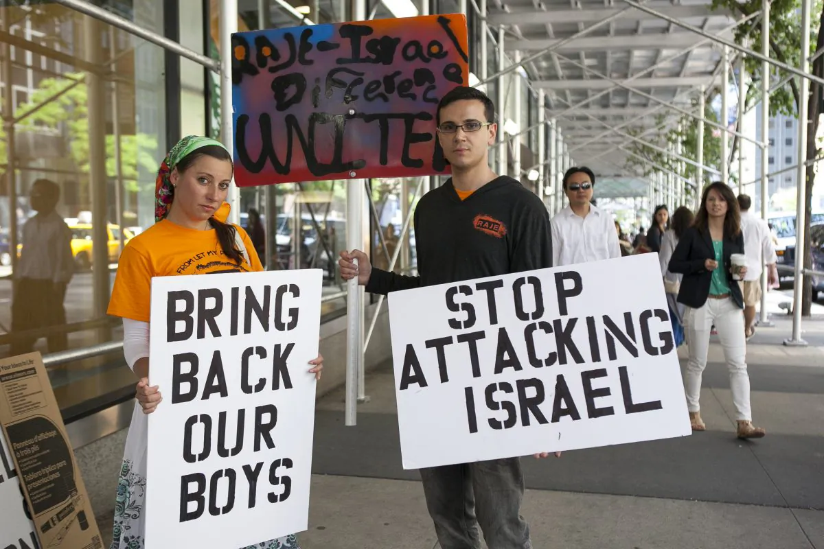 Supporters after a rally near the Israeli Consulate in New York City to bring awareness to the kidnapping in Israel of three teenage boys, New York, June 16, 2014. (Samira Bouaou/Epoch Times)