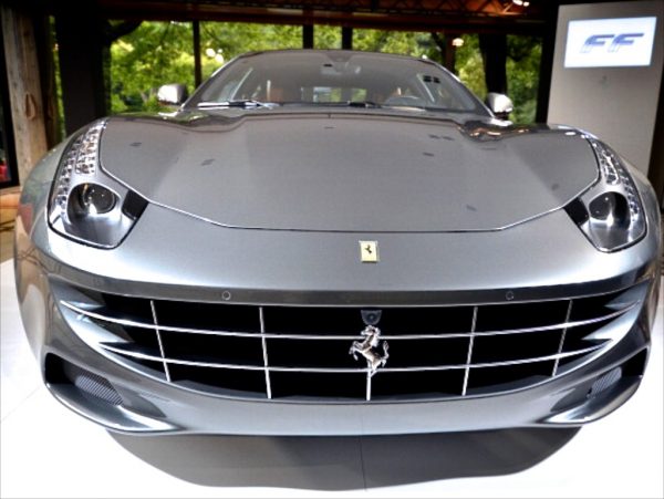 An Italian Ferrari FF, a four wheel drive vehicle that is to be auctioned off, stands at the Italian embassy in Tokyo on July 4, 2011. The four-seater, four-wheel drive sports car with V12 6.2-litter engine will be auctioned for the charity to in support of the victims of the March 11 tsunami and earthquake disaster. (Yoshikazu Tsuno/AFP/Getty Images)
