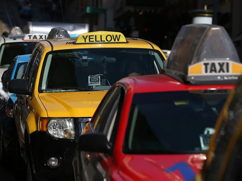 Car-Ride Services UberX and Lyft are now both wooing customers in Miami. While old-fashioned Cab Services have their own fleet, UberX operates only as a digital dispatcher. (Photo: Getty Images)