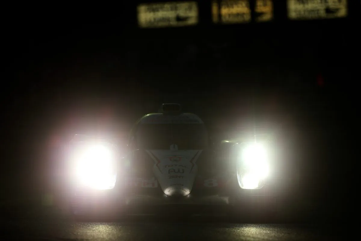 The #8 Toyota TS040 Hybrid is still running after repairs but is 12 laps behind its sister car, the race-leading #7 TS 040-Hybrid, halfway through the Le Mans 24-hour race from Le Mans, France, June14–15, 2014. (ToytaHybridRacing.com)