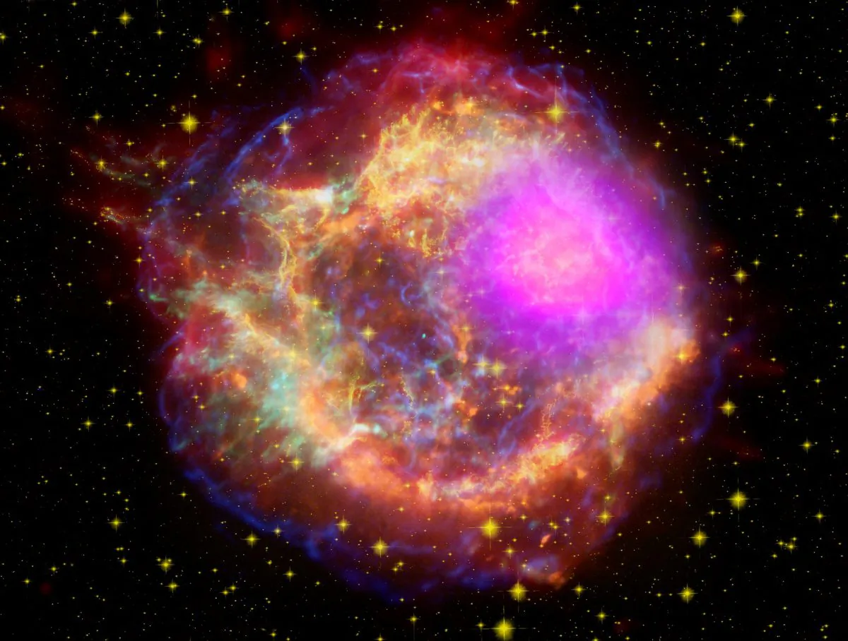 This composite shows the Cassiopeia A supernova remnant that has magnetic fields that are approximately 100 times stronger than those in adjacent interstellar space. (NASA/DOE/Fermi LAT Collaboration, CXC/SAO/JPL-Caltech/Steward/O. Krause et al., and NRAO/AUI)