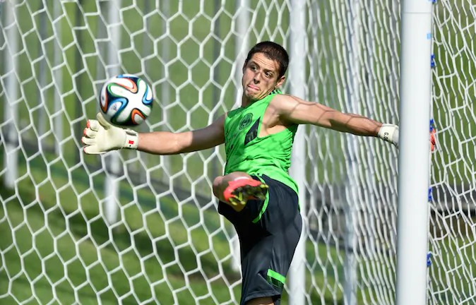 Mexico's forward Javier Hernandez acts as goalkeeper during a training session at the Modesto Roma Complex in Santos , Sao Paulo, Brazil on June 8, 2014. (YURI CORTEZ/AFP/Getty Images)