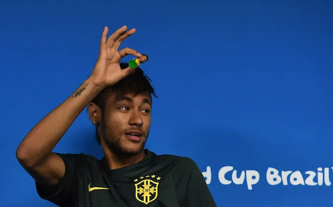 Brazil's forward Neymar looks at journalists during a press conference in Sao Paulo, Brazil on June 11, 2014 on the eve of the opening match of the 2014 FIFA World Cup between Brazil and Croatia. (PEDRO UGARTE/AFP/Getty Images)