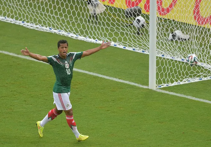 Mexico's forward Giovani Dos Santos reacts after his goal was disallowed during the Group A football match between Mexico and Cameroon at the Dunas Arena in Natal during the 2014 FIFA World Cup on June 13, 2014. (GABRIEL BOUYS/AFP/Getty Images)