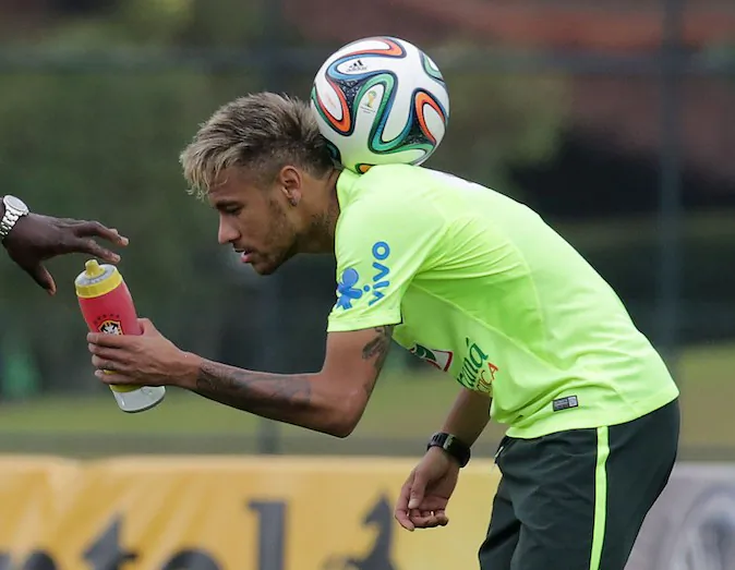 Brazilian national football team player Neymar takes part in a training session at the squad's Granja Comary training complex in Teresopolis, Brazil on June 15, 2014. (ARI VERSIANI/AFP/Getty Images)