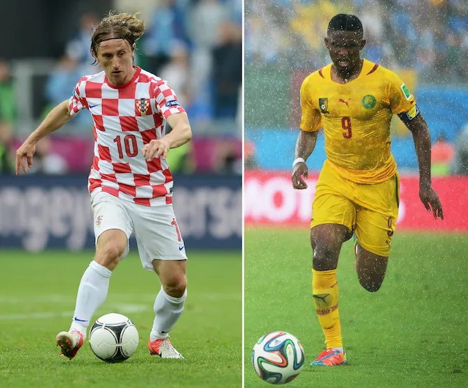 Croatian midfielder Luka Modric (L) and Cameroon forward Samuel Eto'o. Cameroon and Croatia clash in Manaus on June 18, 2014 looking to put their troubles behind them and keep alive their hopes of making the World Cup knock-out rounds. (FRANCISCO LEONG/AFP/Getty Images)