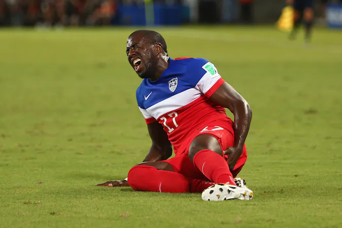 An injured Jozy Altidore of the United States lies on the field during the 2014 FIFA World Cup Brazil Group G match between Ghana and the United States at Estadio das Dunas on June 16, 2014 in Natal, Brazil. (Michael Steele/Getty Images)