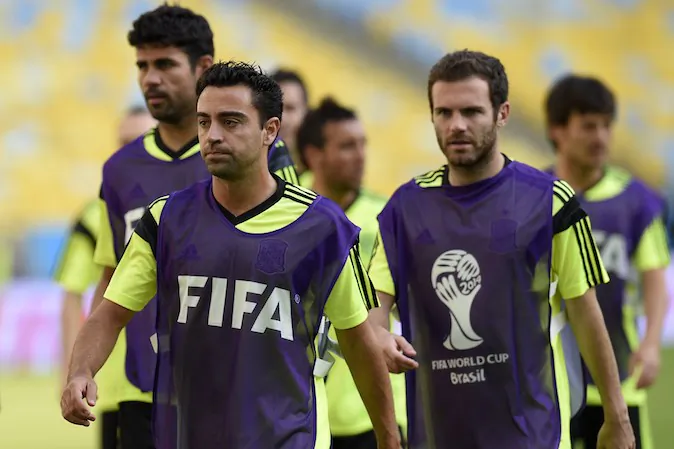 Spain's midfielder Xavi (C) attends a training session with teammates at the Maracana Stadium in Rio de Janeiro during the 2014 FIFA World Cup football tournament on June 17, 2014. (LLUIS GENE/AFP/Getty Images)