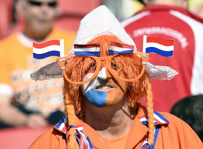 A Netherlands' supporter waits for the start of a Group B football match between Australia and the Netherlands at the Beira-Rio Stadium in Porto Alegre during the 2014 FIFA World Cup on June 18, 2014. (JUAN BARRETO/AFP/Getty Images)