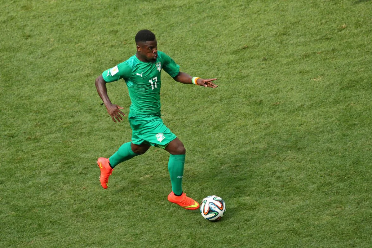 Serge Aurier of the Ivory Coast controls the ball during the 2014 FIFA World Cup Brazil Group C match between Colombia and Cote D'Ivoire at Estadio Nacional on June 19, 2014 in Brasilia, Brazil. (Adam Pretty/Getty Images)