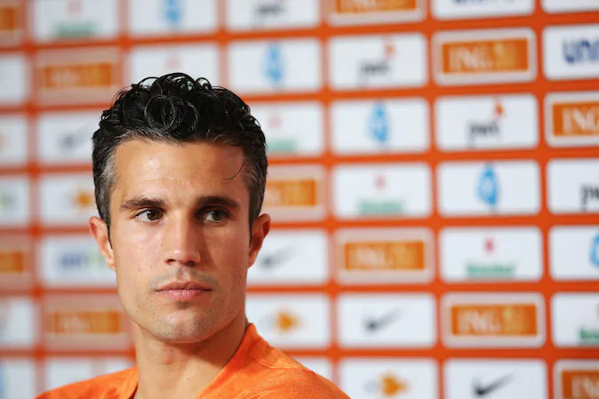 Robin van Persie speaks to the media during the Netherlands Press Conference at the 2014 FIFA World Cup Brazil held at the Estadio Jose Bastos Padilha Gavea on June 20, 2014 in Rio de Janeiro, Brazil. (Photo by Dean Mouhtaropoulos/Getty Images)