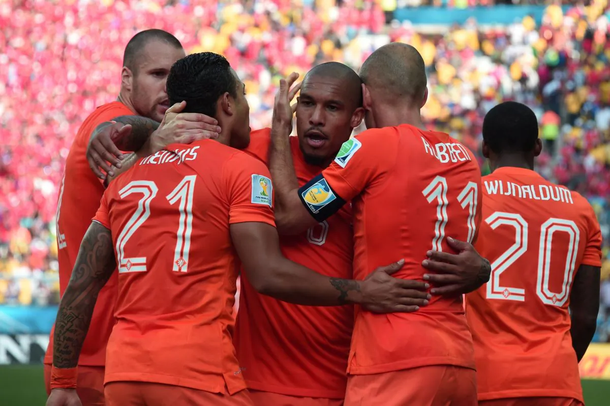 Netherlands' forward Memphis Depay (C) celebrates scoring with his teammates during the Group B football match between Netherlands and Chile at the Corinthians Arena in Sao Paulo during the 2014 FIFA World Cup on June 23, 2014. (DAMIEN MEYER/AFP/Getty Images)