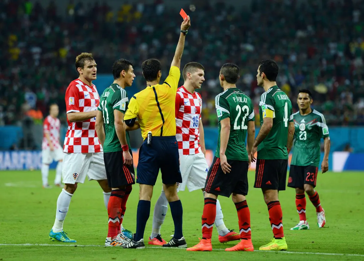 Ante Rebic of Croatia receives a red card during the 2014 FIFA World Cup Brazil Group A match between Croatia and Mexico at Arena Pernambuco on June 23, 2014 in Recife, Brazil. (Photo by Jamie McDonald/Getty Images)