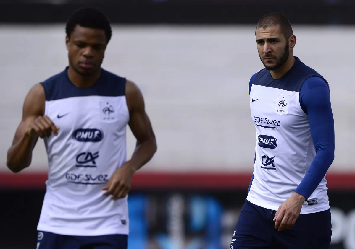 France's forward Karim Benzema (R) and France's forward Loic Remy attend a team training session at the Santa Cruz stadium in Ribeirao Preto on June 28, 2014, during the 2014 FIFA World Cup in Brazil. (FRANCK FIFE/AFP/Getty Images)