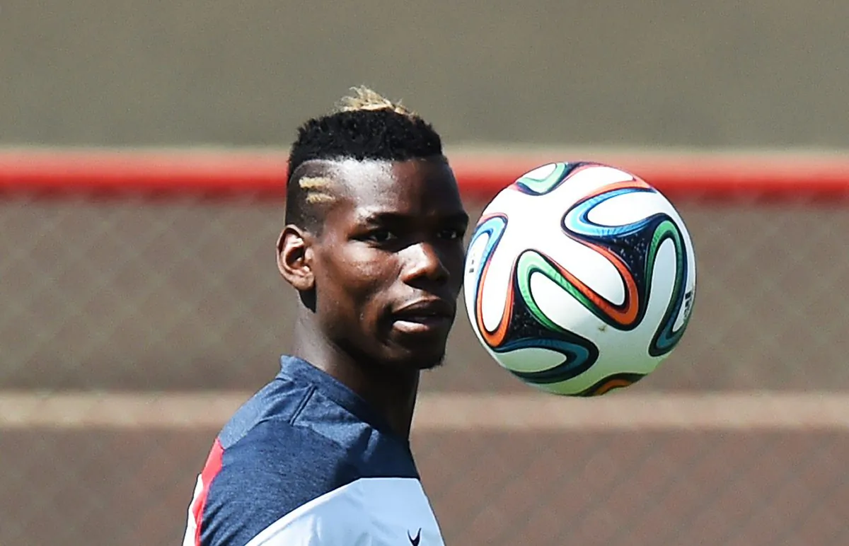 France's midfielder Paul Pogba eyes the ball during a training session in Brasilia on June 29, 2014, on the eve of their FIFA 2014 World Cup Round of 16 football match against Nigeria. (JEWEL SAMAD/AFP/Getty Images)