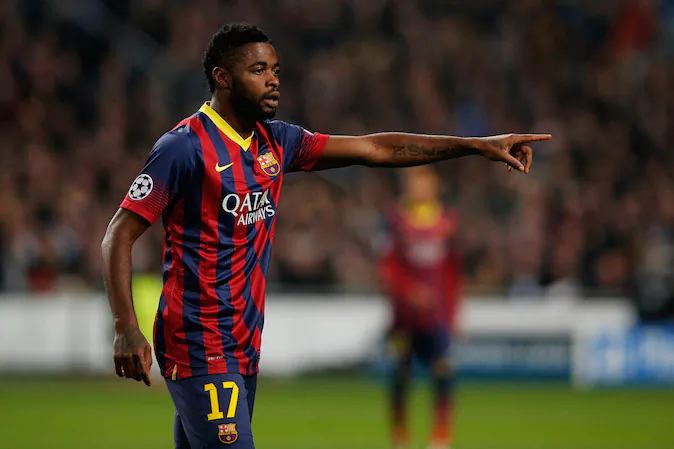 Alex Song of Barcelona speaks to a team mate during the UEFA Champions League Group H match between Ajax Amsterdam and FC Barcelona at Amsterdam Arena on November 26, 2013 in Amsterdam, Netherlands. (Dean Mouhtaropoulos/Getty Images)