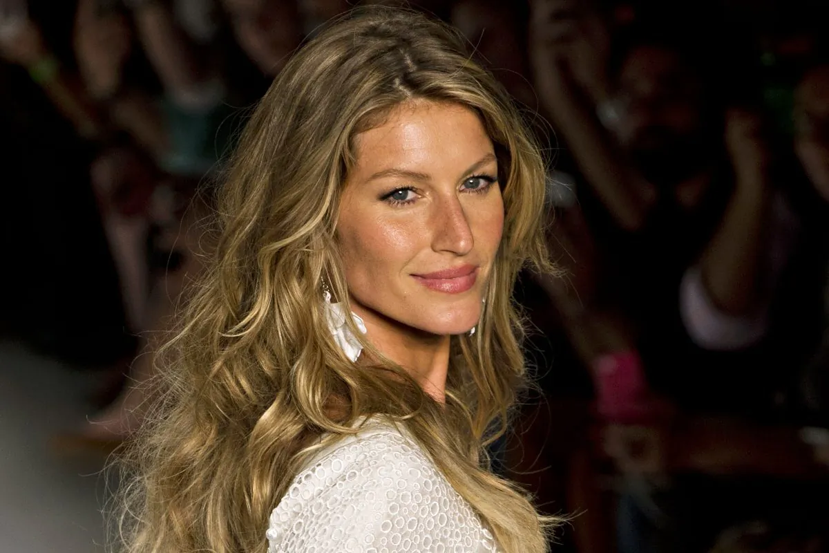 Brazilian supermodel Gisele Bundchen presents a creation by Colcci during the 2015 Summer collections of the Sao Paulo Fashion Week in Sao Paulo, Brazil, on April 2, 2014. (AFP ALMEIDA/AFP/Getty Images)
