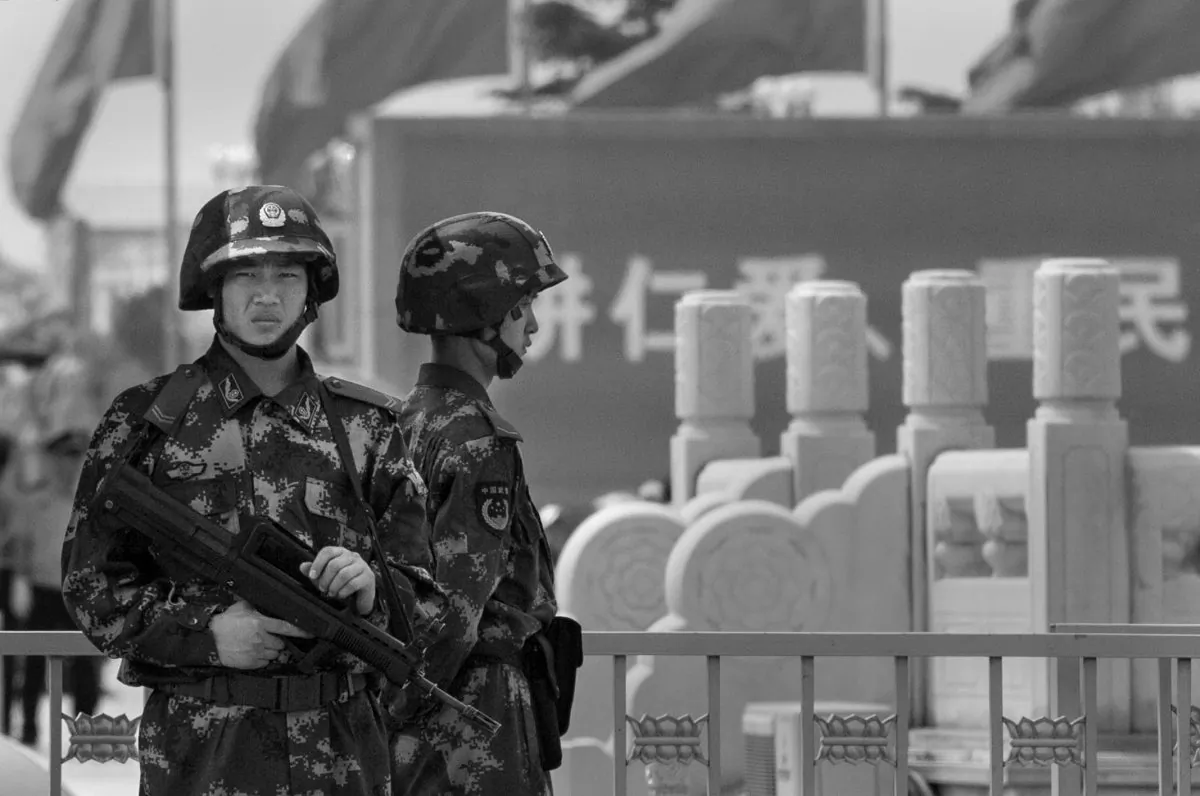 Chinese Paramilitary police stand guard in Tiananmen Square on June 4, 2014 in Beijing, China. (Kevin Frayer/Getty Images)