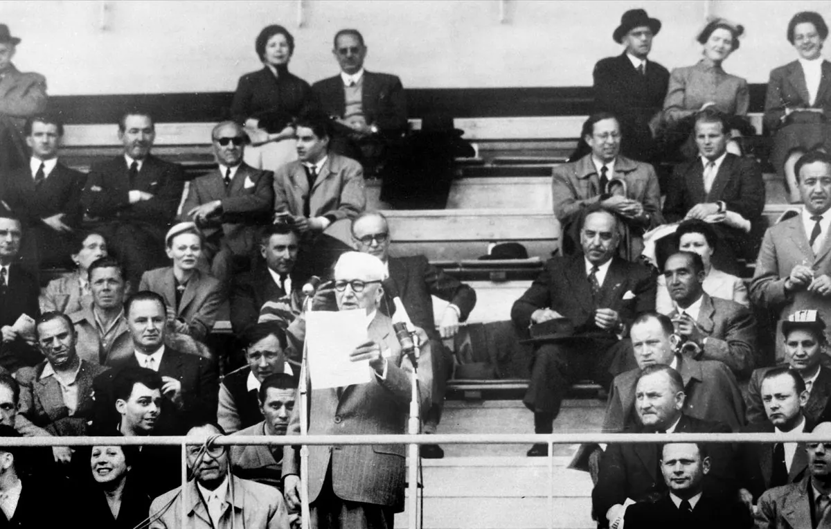 The president of the Federation Internationale de Football Federation (FIFA), Frenchman Jules Rimet, proclaims the official opening of the 5th World Cup, 16 June 1954 at La Pontaise stadium in Lausanne. (AFP/Getty Images)