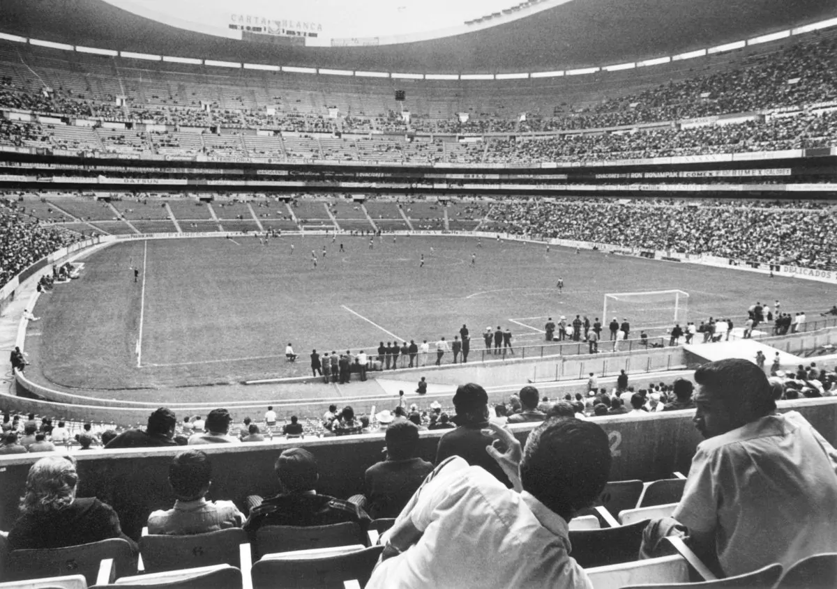 Soccer fans watch a match in progress 21 April 1970 at the Azteca stadium in Mexico City. The stadium with a capacity of 110.000 spectators was one of the venues for the World Cup. (STAFF/AFP/Getty Images)