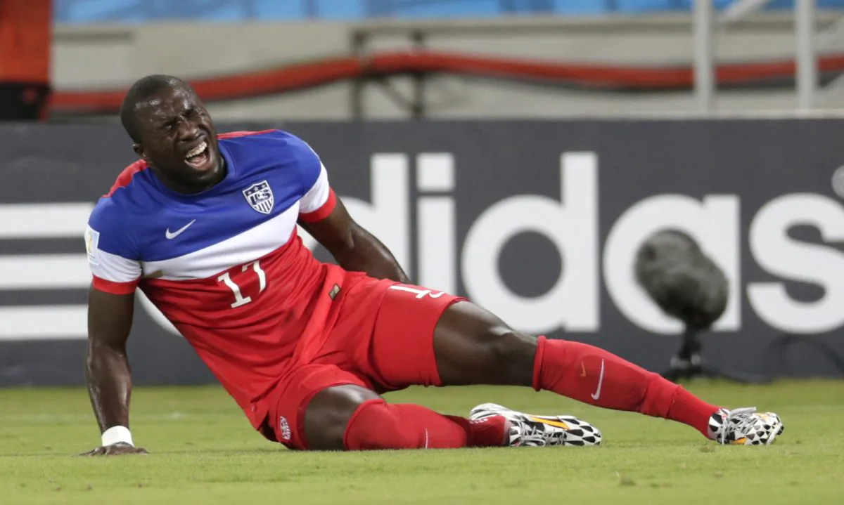 United States' Jozy Altidore grimaces after pulling up injured during the group G World Cup soccer match between Ghana and the United States at the Arena das Dunas in Natal, Brazil, Monday, June 16, 2014.  (AP Photo/Dolores Ochoa)