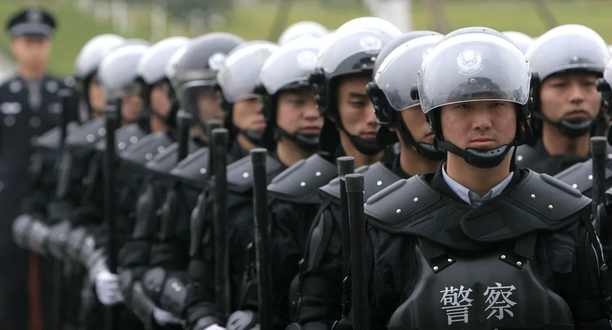 SWAT Team members in Chengdu, China, 2005. Over the last six months the Chinese regime has beefed up its security forces to face off against domestic unrest. (China Photos/Getty Images) 