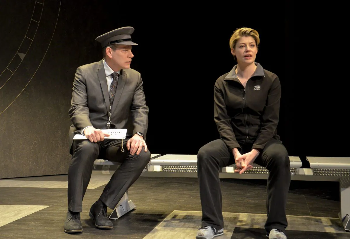 Quentin (Bill Champion) is the officer in charge of stopping a terrorist, and Ez (Elizabeth Boag) is an army officer whose career has seen better days in Alan Ayckbourn’s “Arrivals and Departures.” (Andrew Higgens)