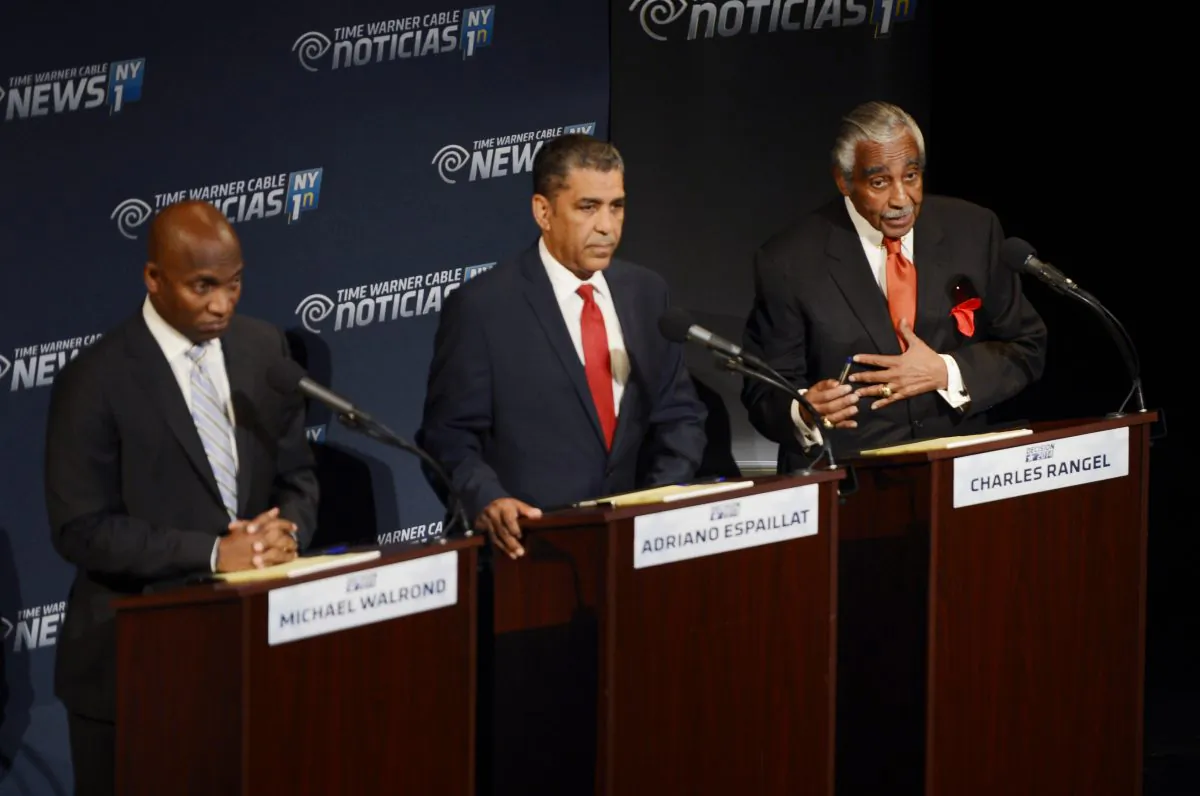 Rep. Charles Rangel, D-NY, right, addresses the panel as Minister Michael Waldrond, Jr., left and New York State Sen. Adriano Espaillat, D-NY, listen, during their televised debate from Lehman College in New York, Wednesday, June 11, 2014. They are seeking the Democratic Party’s nomination to run for the seat New York 13th Congressional District. (AP Photo/New York Daily News, Peter Gabel)
