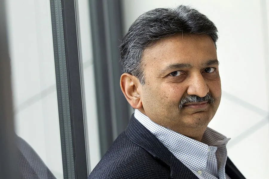 Nishit Parikh, chairman of diamond company Diarough, poses during the presentation of the most expensive diamond-encrusted boots in the world on display at the MAS Museum in Antwerp, on Feb. 10. (Kristof van Accom/AFP/Getty Images)