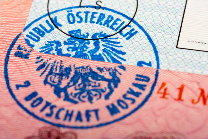 An Austrian passport stamp. A man who drove a Swiss car across the Austrian border got slapped with a hefty fine for violating a little-known law. (Shutterstock*)