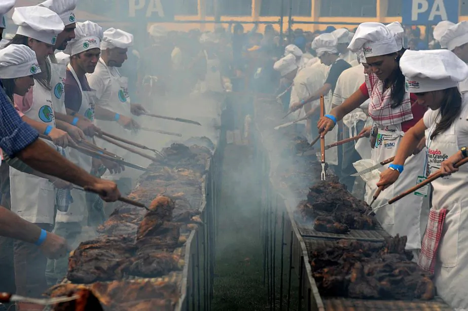 Cooks grill 26,400 pounds of beef during an event to break the Guinness record in Montevideo, Uruguay, on April 13, 2008. (Pablo Porciuncula/AFP/Getty Images)