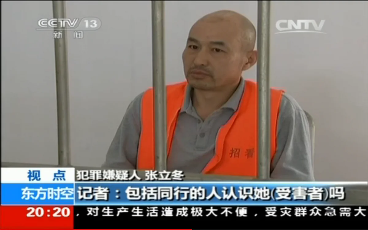 Zhang Lidong, the leader of a gang that killed a young woman, is interviewed by the Chinese Central Television on May 31. Zhang and five others beat a woman to death in a McDonalds in Zhaoyuan City of Shandong Province on May 28. (Screenshot via CCTV)