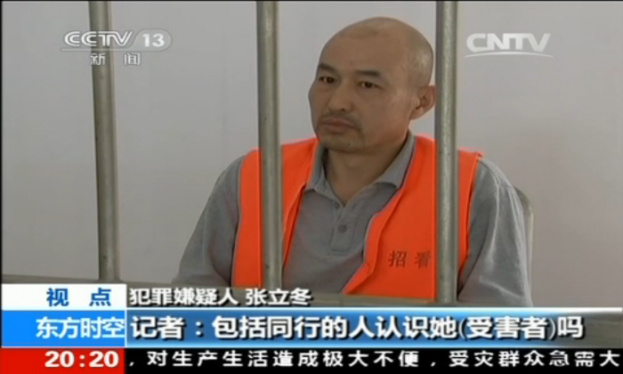 Zhang Lidong, the leader of a gang that killed a young woman, is interviewed by the Chinese Central Television on May 31. Zhang and five others beat a woman to death in a McDonalds in Zhaoyuan City of Shandong Province on May 28. (Screenshot via CCTV)