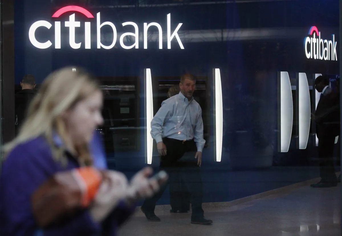 People walk past a Citibank branch on in New York City. (Mario Tama/Getty Images) 