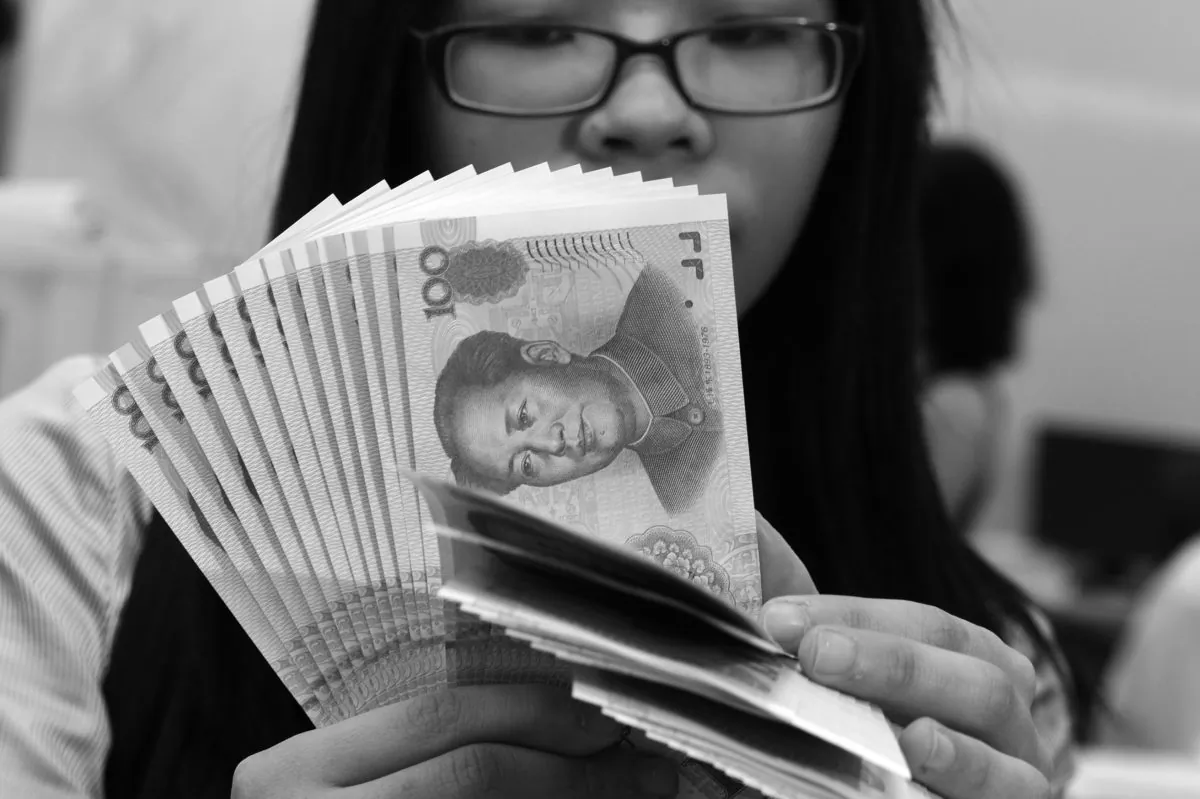 The 2013 audit of the revenue and expenditure of 38 central sector units show billions of illegal income, according to official reports. (Sam Yeh/AFP/Getty Images)