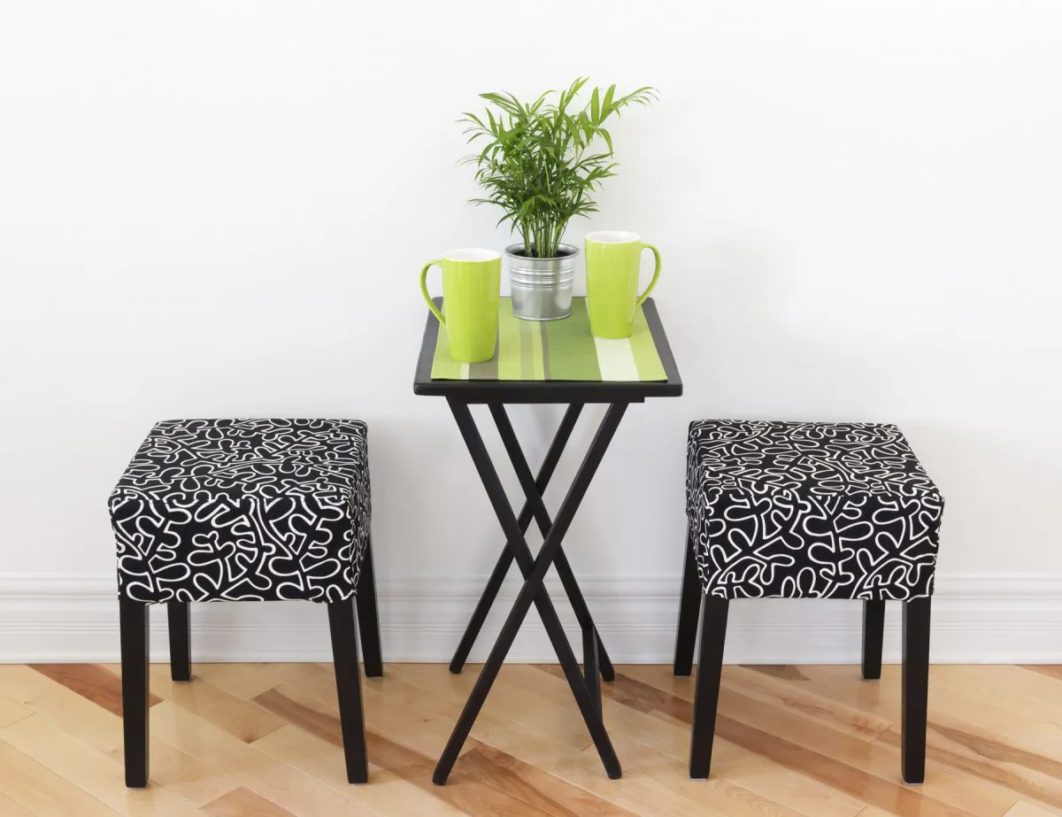Small, casual pieces of furniture can be moved around when entertaining. Stools can do double duty as side tables. (AnikaSalsera/iStock/Thinkstock)