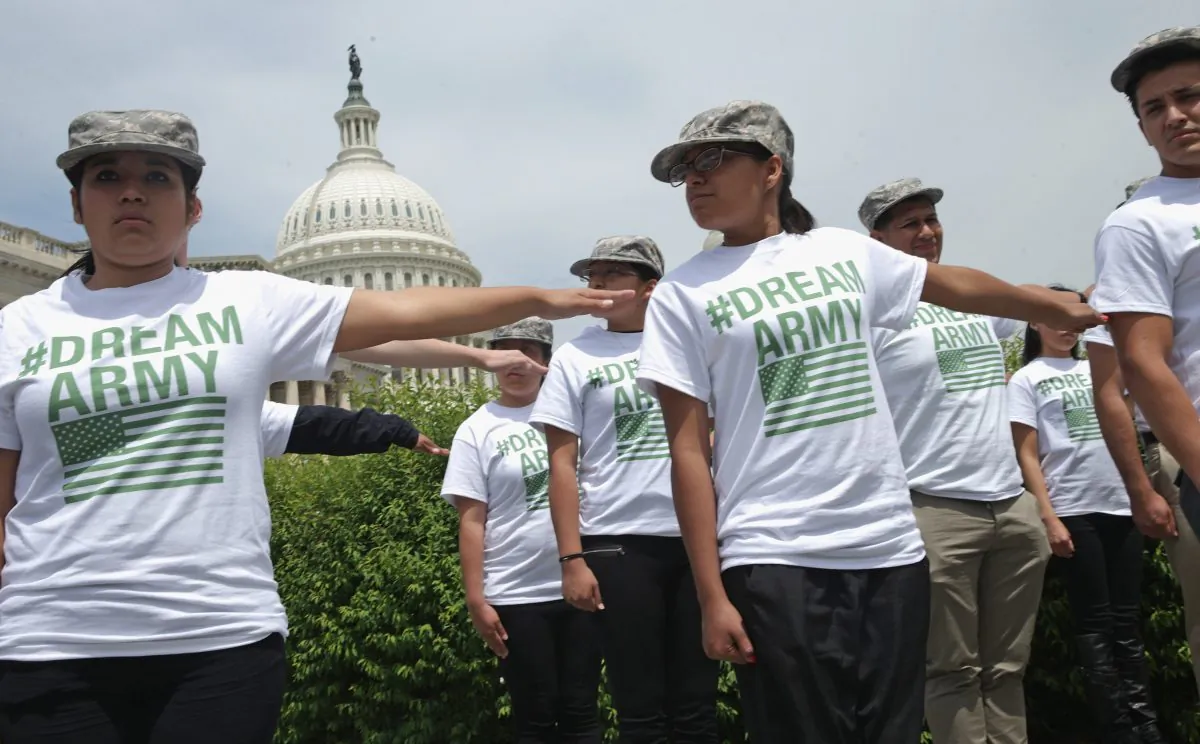 Undocumented youth show their support for the ENLIST Act at a rally in front of the U.S. Capitol on May 20, 2014. (Somodevilla/Getty Images)