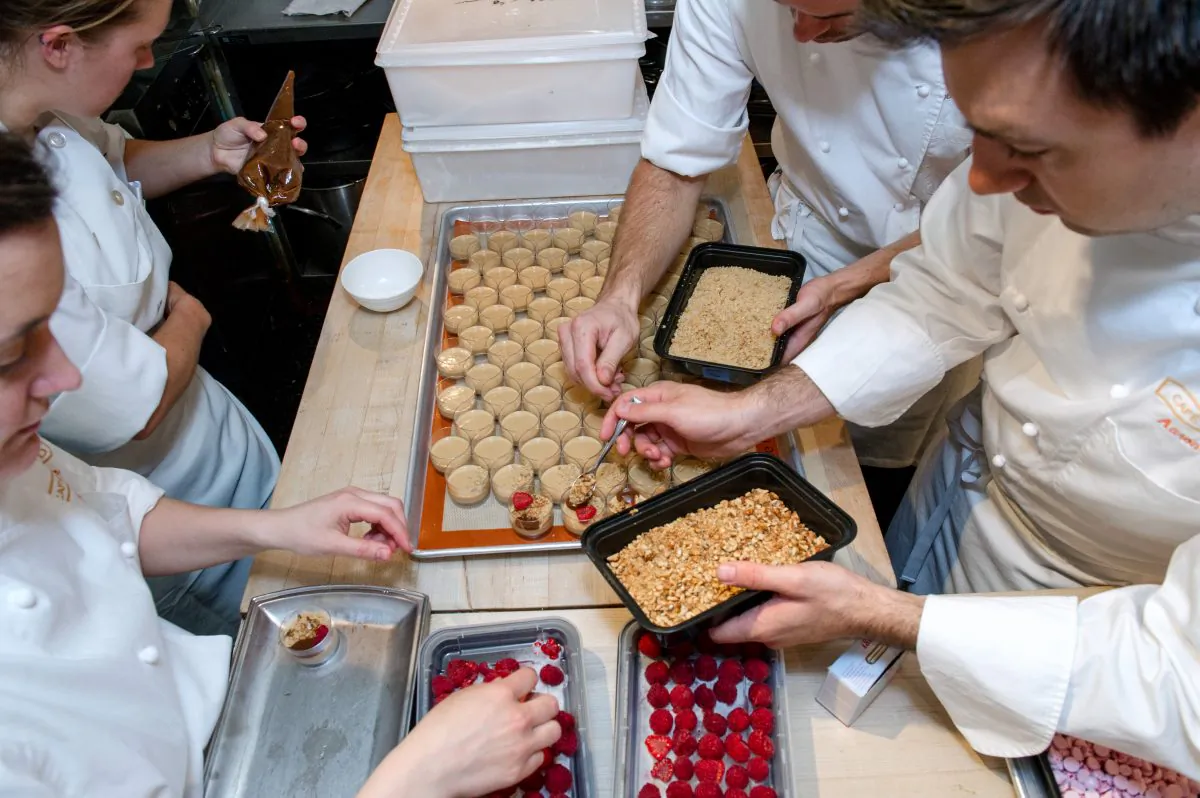 Chefs prepare PB&J with Caramel Custard, Virginia Peanut Crumble and Raspberry Soda at JBF's Taste America kick-off on June 17. (Courtesy of Ken Goodman)