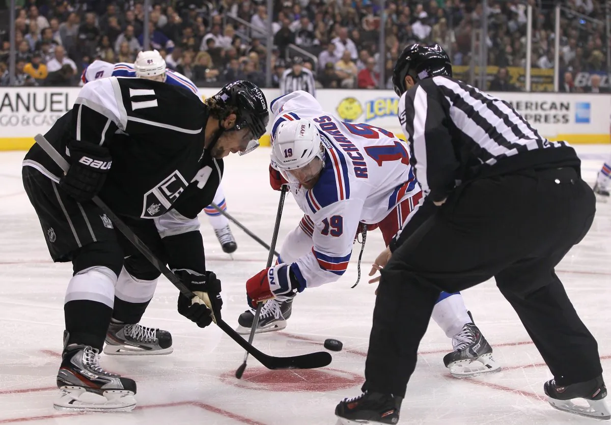 Anze Kopitar of the Los Angeles Kings and Brad Richards of the New York Rangers prepare to take a face-off in Los Angeles on Oct. 7, 2013.
(Victor Decolongon/Getty Images)